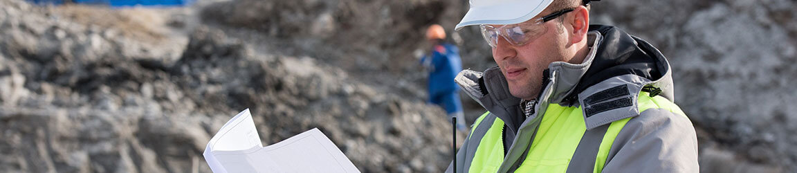 Man wearing hardhat on a worksite