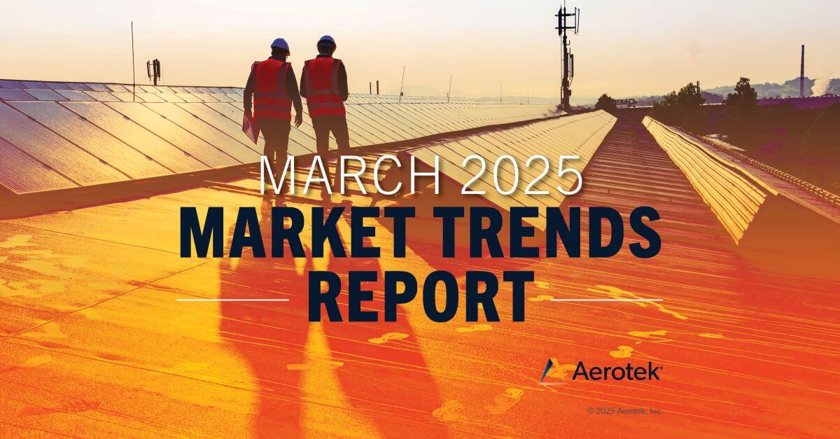 The caption "March 2025 Market Trends Report" overlays two maintenance workers in hard hats and orange reflective vests walking on a solar-panel-covered roof